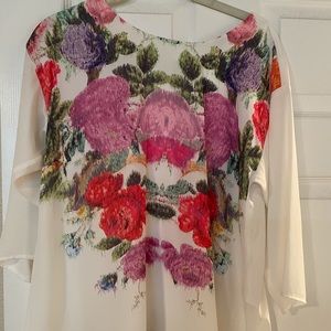 H&M cream colored top with floral detail